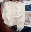 CARDIGAN DECORADO COM PÉROLAS