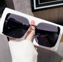 ÓCULOS DE SOL FEMININO MEIA ARMAÇÃO E BRILHO